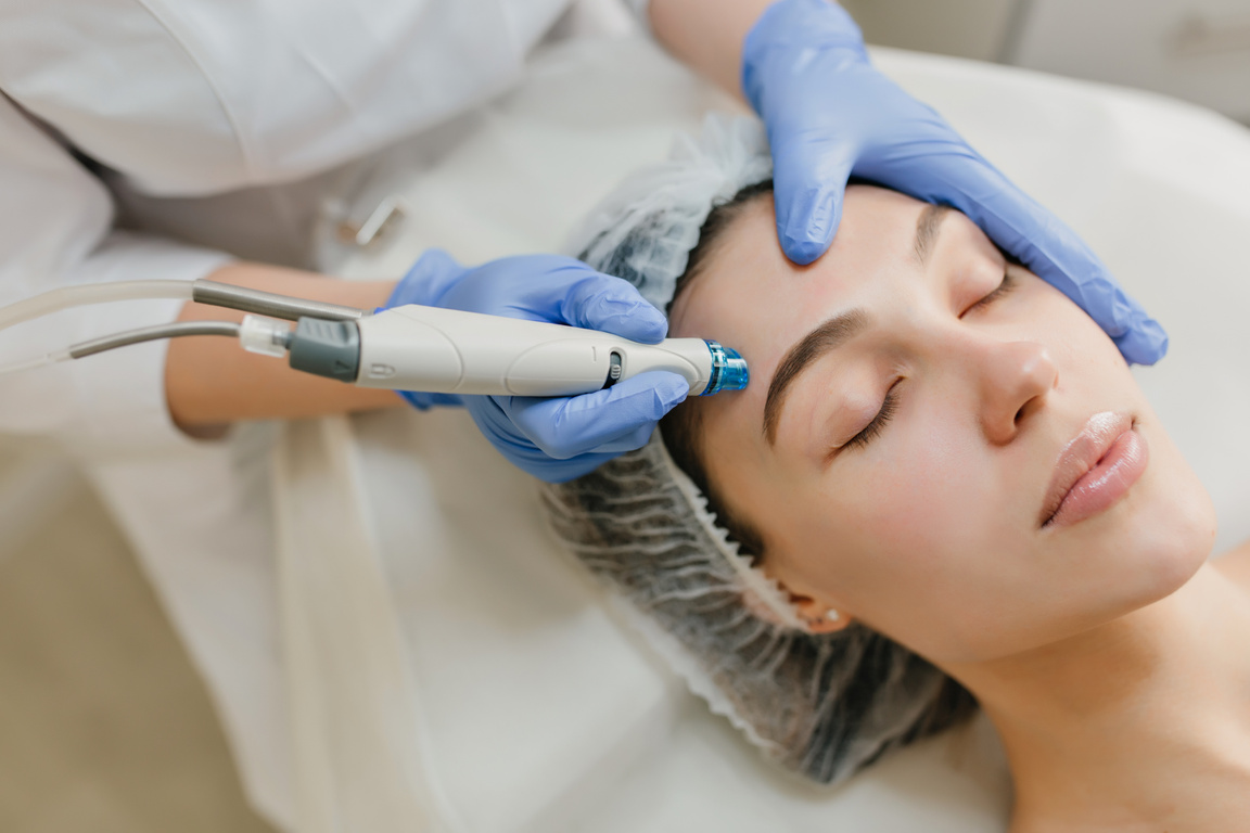 Closeup Portrait of Beautiful Woman during Cosmetology  in Beauty Salon. Professional Dermato